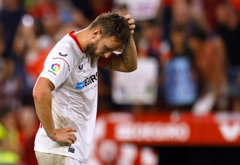 Sevilla's Ivan Rakitic looks dejected after the match. Reuters