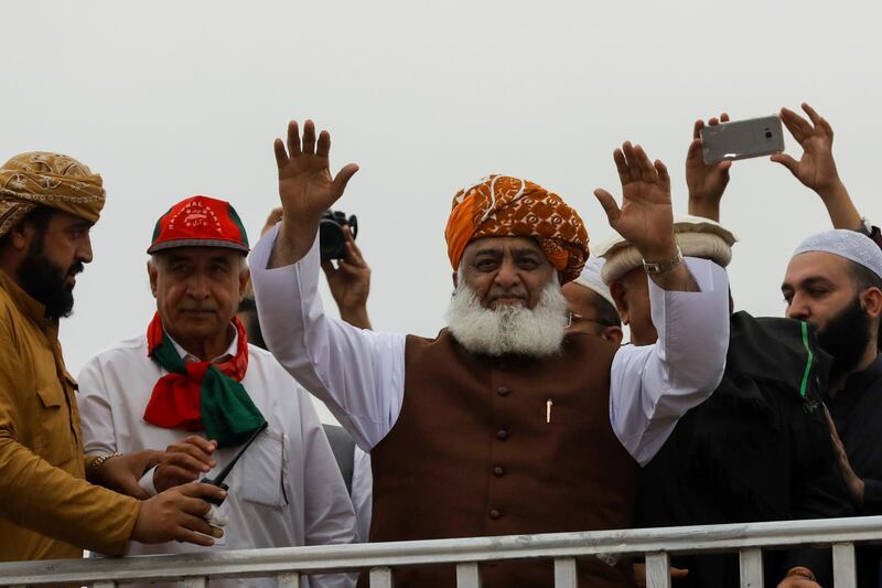 Fazal-ur Rehman, President of the Jamiat Ulema-e-Islam-Fazal (JUI-F) waves to supporters during what participants call Azadi March (Freedom March) to protest the government of Prime Minister Imran Khan, in Islamabad, Pakistan November 1, 2019. REUTERS/Akhtar Soomro