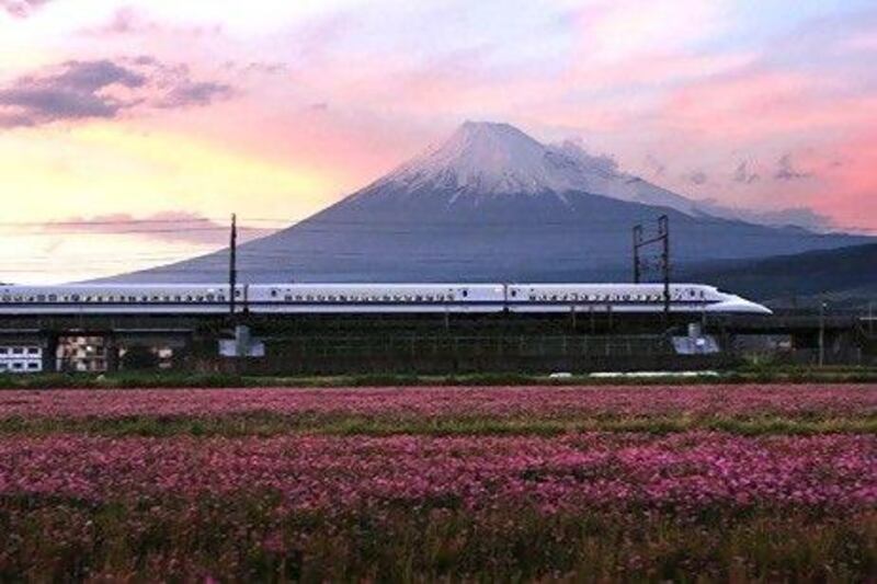 Central Japan Railway's 700 series Shinkansen bullet train travels past Mount Fuji in Shizuoka Prefecture. Tomohiro Ohsumi / Bloomberg News