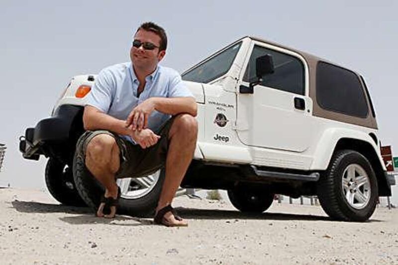 Dubai resident Christopher Saul with his Jeep Wrangler Sahara, which he and his wife enjoy driving off road at weekends.