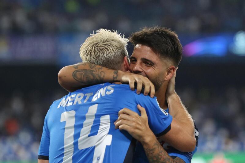 Napoli's Dries Mertens celebrates with teammate Lorenzo Insigne after converting a penalty. EPA
