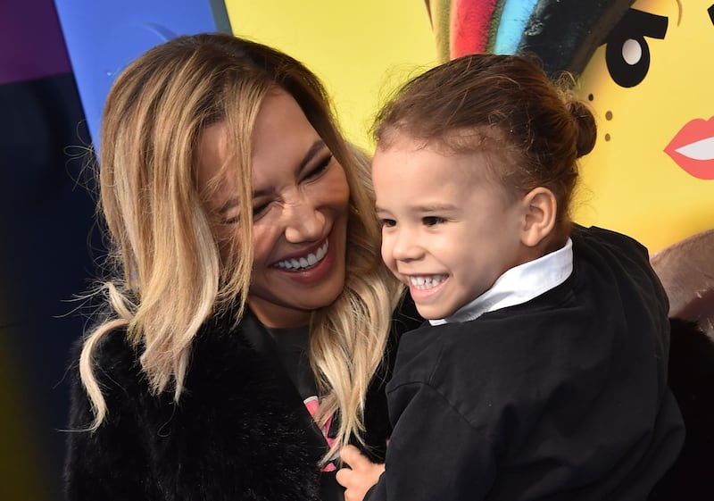 (FILES) In this file photo taken on February 2, 2019 US actress Naya Rivera and son Josey Hollis Dorsey arrive for the premiere of "The Lego Movie 2: The Second Part" at the Regency Village theatre in Westwood, California. The death of "Glee" actress Naya Rivera in a California lake last week was ruled an accidental drowning by medical examiners on July 14, 2020. / AFP / Chris Delmas
