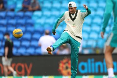 HOBART, AUSTRALIA - JANUARY 15: Usman Khawaja of Australia warms up prior to day two of the Fifth Test in the Ashes series between Australia and England at Blundstone Arena on January 15, 2022 in Hobart, Australia. (Photo by Robert Cianflone / Getty Images)