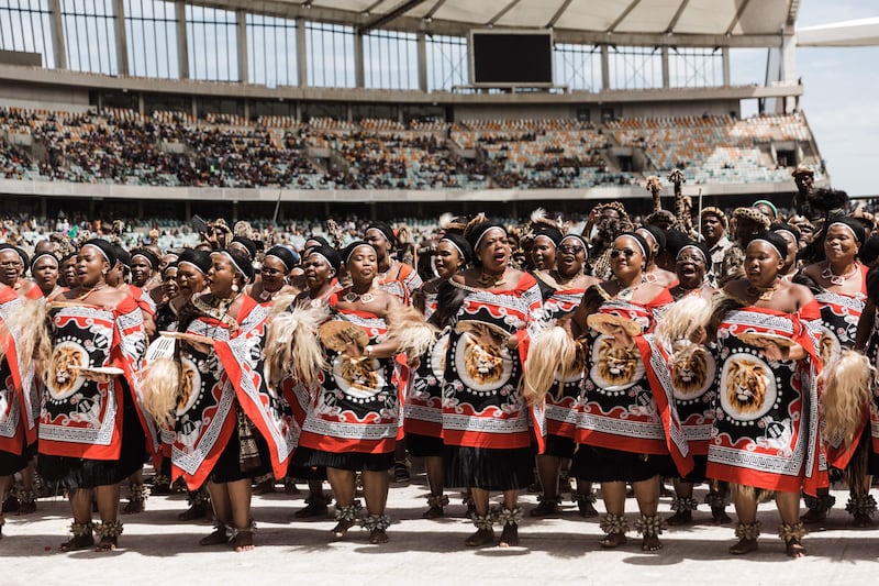 Women wearing traditional attire from Swaziland perform a dance at the King Misuzulu Zulu's coronation at the Moses Mabhida Stadium in Durban. AFP