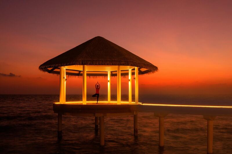 Find your zen with the resort's over-water yoga pavilion. Radisson Blu