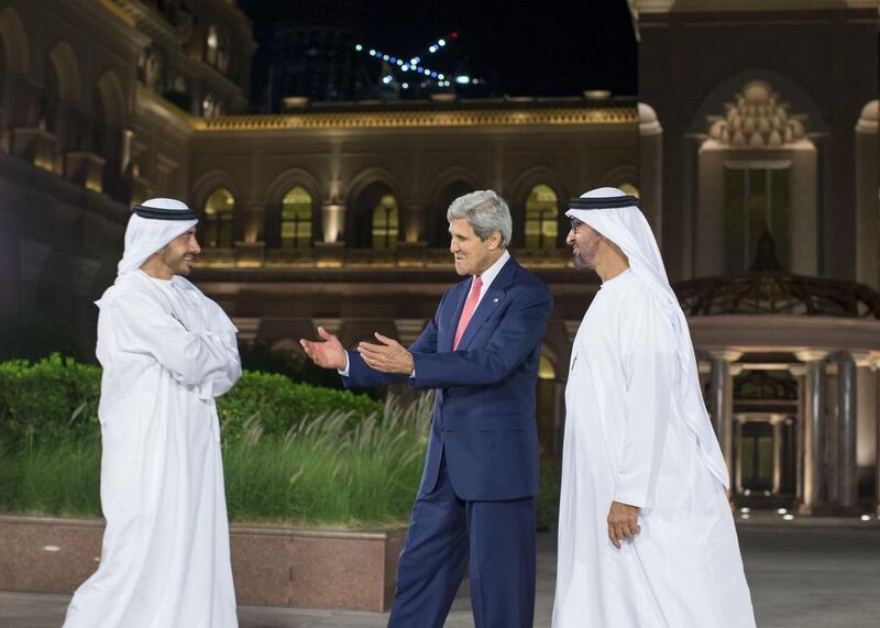 Sheikh Mohammed bin Zayed, Crown Prince of Abu Dhabi and Deputy Supreme Commander of the Armed Forces, and Sheikh Abdullah bin Zayed, the Minister of Foreign Affairs, greet the US secretary of state John Kerry last night on his arrival in Abu Dhabi.   Ryan Carter / Crown Prince Court – Abu Dhabi