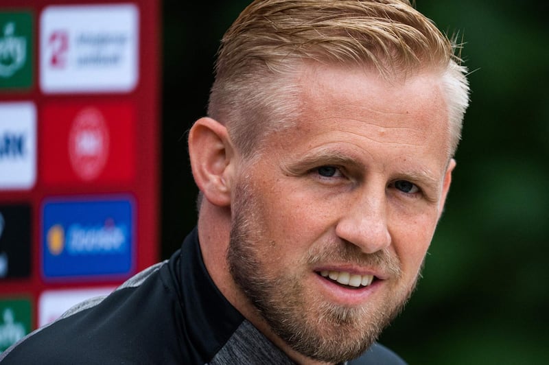 Denmark goalkeeper Kasper Schmeichel said he had visited Christian Eriksen in hospital and that he was 'smiling and laughing'. AFP