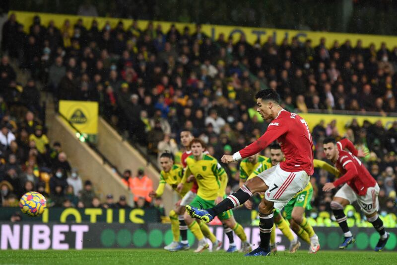 Manchester United's Cristiano Ronaldo scores from the penalty spot during the Premier League match against Norwich City at Carrow Road in December, 2021. AFP