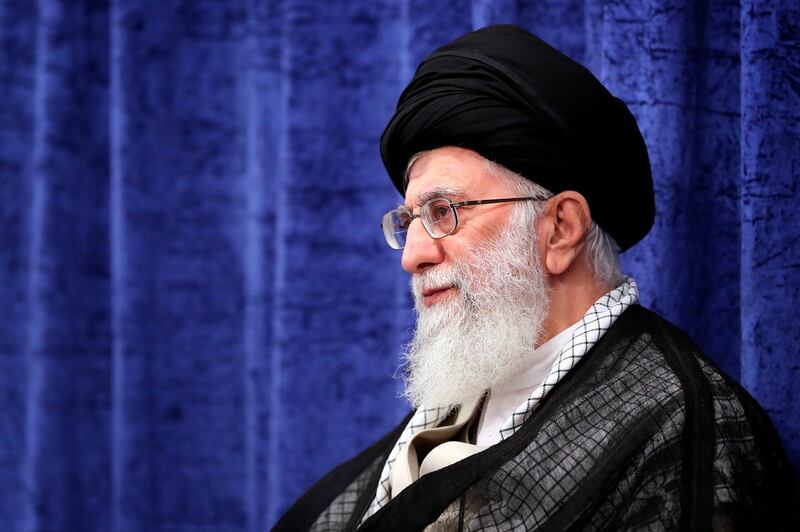 In this picture released by an official website of the office of the Iranian supreme leader, Supreme Leader Ayatollah Ali Khamenei attends a meeting with government officials in Tehran, Iran, Wednesday, May 23, 2018. Iran's supreme leader is criticizing the U.S. over its hard-line stance toward the country since President Donald Trump's decision to withdraw from a landmark nuclear deal with Western powers. (Office of the Iranian Supreme Leader via AP)