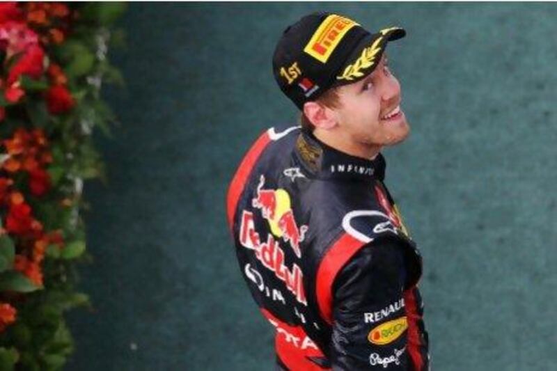 Sebastian Vettel says he is not leaving Red Bull Racing for Ferrari and that he is quite happy where he is.