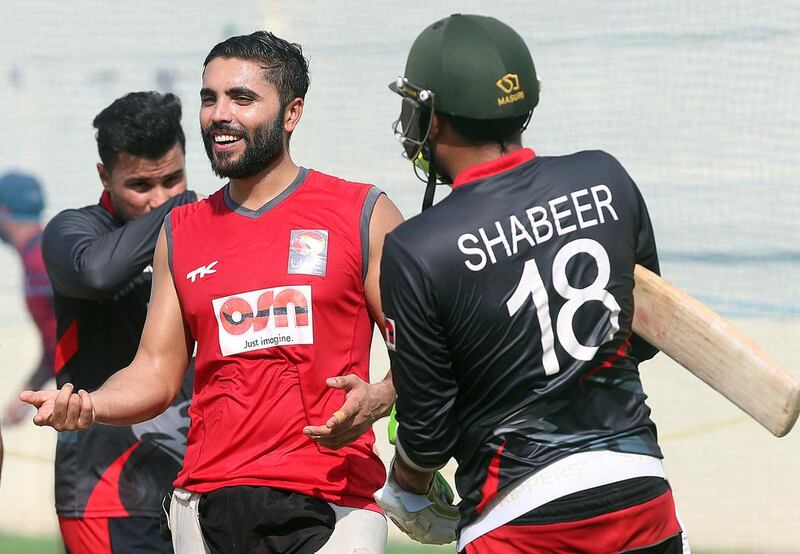 UAE players Rameez Shahzad, left, and Ghulam Shabeer during a training session at the Sharjah Cricket Stadium in Sharjah. Satish Kumar / The National