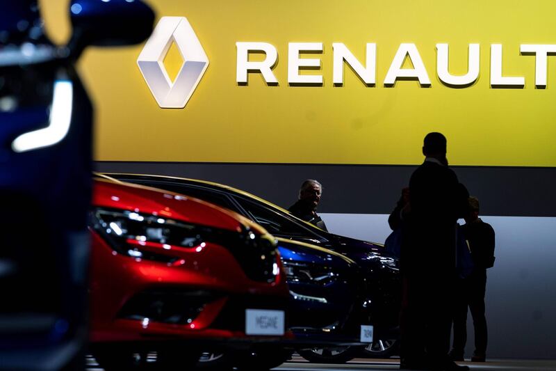 People visit the Renault stand during the Brussel Motor Show on January 9, 2020 in Brussel.   / AFP / Kenzo TRIBOUILLARD
