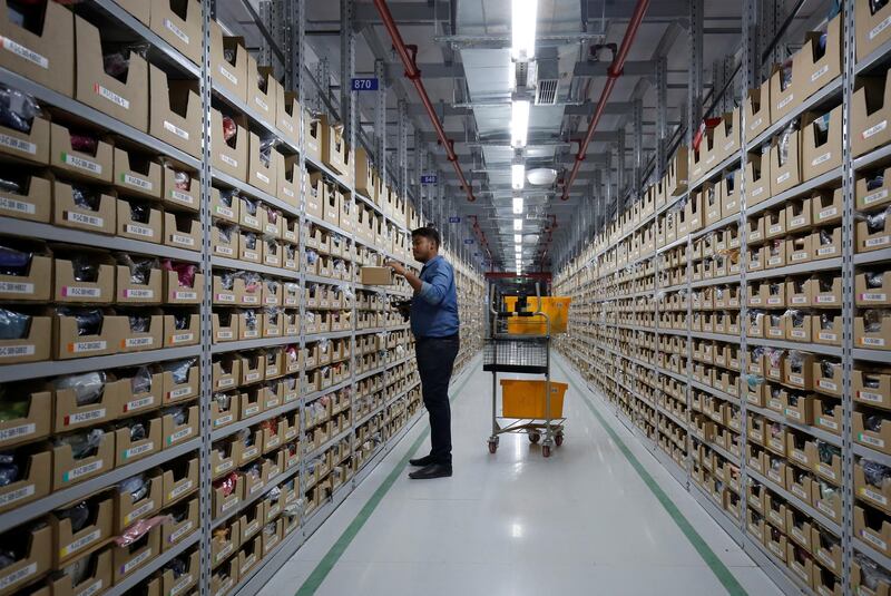 An employee works at an Amazon Fulfillment Centre (BLR7) on the outskirts of Bengaluru, India, September 18, 2018. REUTERS/ Abhishek N. Chinnappa