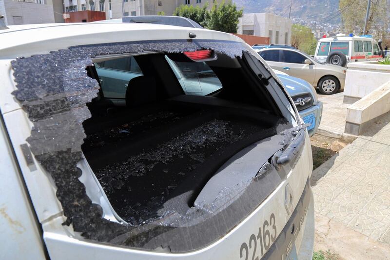 A picture taken on April 21, 2018, shows the shattered rear window of the Red Cross vehicle that was carrying Red Cross employee Hanna Lahoud, parked outside a hospital in the country's third-city of Taiz.
A Red Cross employee was killed in Yemen's southern city of Taez, an ICRC spokesman said, after a gunman had opened fire on an ICRC vehicle in the Zabab district in the west of the city.
The aid worker was killed by multiple gunshots to the heart, according to a hospital source who spoke on condition of anonymity. / AFP PHOTO / Ahmad AL-BASHA