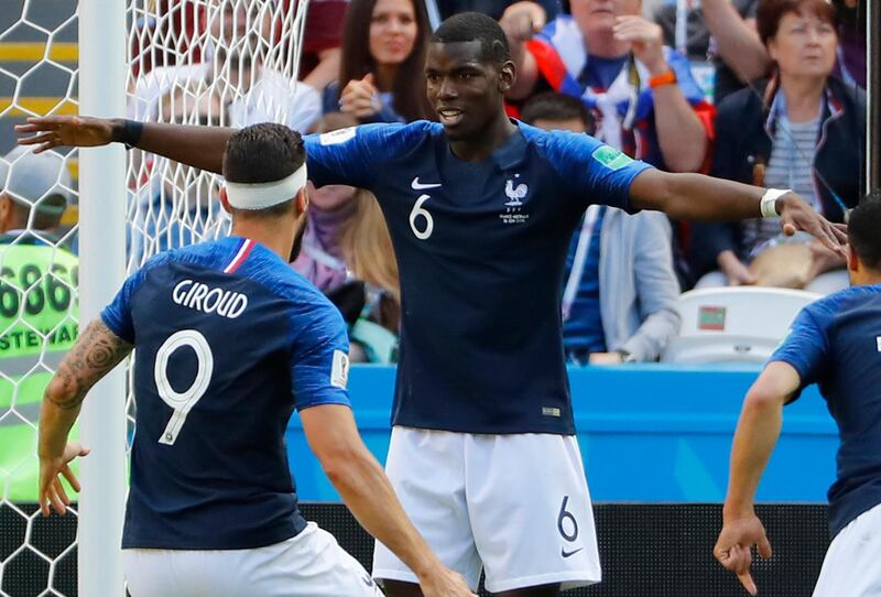 epa06812649 Paul Pogba (2-L) of France celebrates with team mate Olivier Giroud (L) after scoring the 2-1 lead during the FIFA World Cup 2018 group C preliminary round soccer match between France and Australia in Kazan, Russia, 16 June 2018.

(RESTRICTIONS APPLY: Editorial Use Only, not used in association with any commercial entity - Images must not be used in any form of alert service or push service of any kind including via mobile alert services, downloads to mobile devices or MMS messaging - Images must appear as still images and must not emulate match action video footage - No alteration is made to, and no text or image is superimposed over, any published image which: (a) intentionally obscures or removes a sponsor identification image; or (b) adds or overlays the commercial identification of any third party which is not officially associated with the FIFA World Cup)  EPA/DIEGO AZUBEL   EDITORIAL USE ONLY