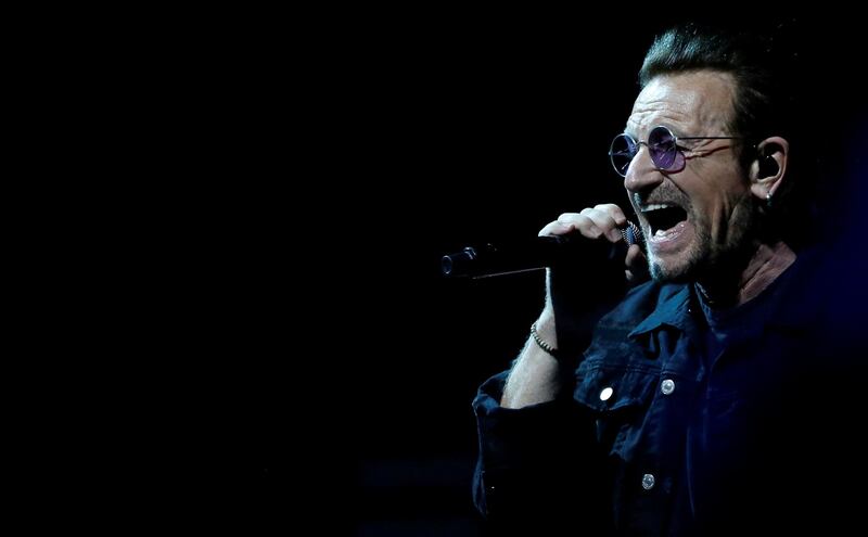FILE PHOTO: Bono of U2 performs during the band's "Experience + Innocence" tour at The Forum in Inglewood, California, U.S., May 16, 2018. REUTERS/Mario Anzuoni/File Photo
