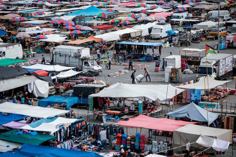 A view of an outdoor market in the Nuseirat refugee camp in central Gaza Strip, which has reopened after the Covid-19 restrictions. AFP