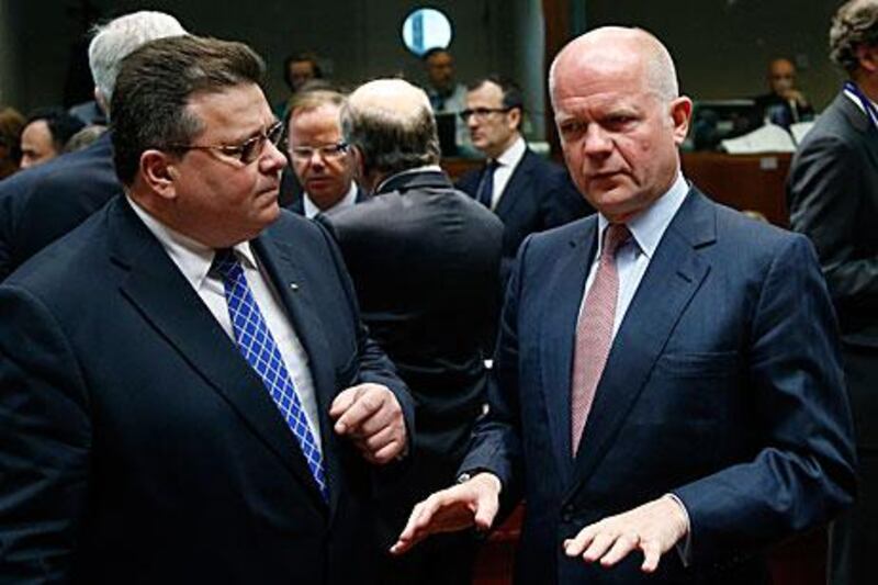 William Hague, the UK foreign secretary, talks to Lithuania's foreign minister, Linas Linkevicius in Brussels. Francois Lenoir / Results