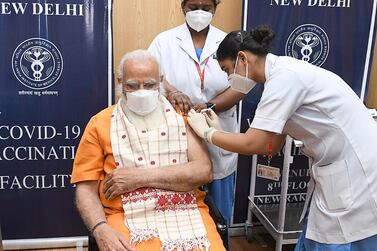 India's Prime Minister Narendra Modi receives the second dose of the Covaxin Covid-19 coronavirus vaccine, at AIIMS hospital in New Delhi. AFP