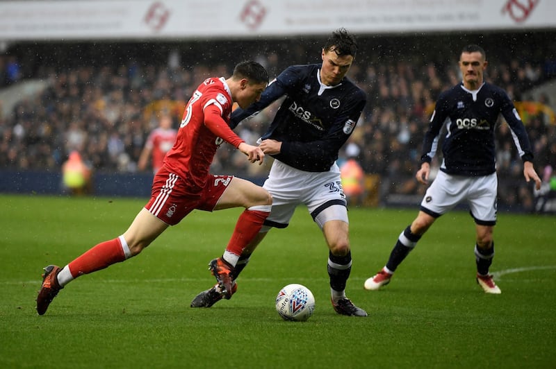 Soccer Football - Championship - Millwall vs Nottingham Forest - The Den, London, Britain - March 30, 2018  Millwall's Jake Cooper in action with Nottingham Forest's Joe Lolley  Action Images/Tony O'Brien  EDITORIAL USE ONLY. No use with unauthorized audio, video, data, fixture lists, club/league logos or "live" services. Online in-match use limited to 75 images, no video emulation. No use in betting, games or single club/league/player publications. Please contact your account representative for further details.