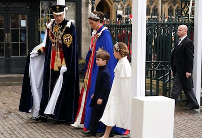 The Prince and Princess of Wales with Princess Charlotte and Prince Louis arriving at Westminster Abbey. PA