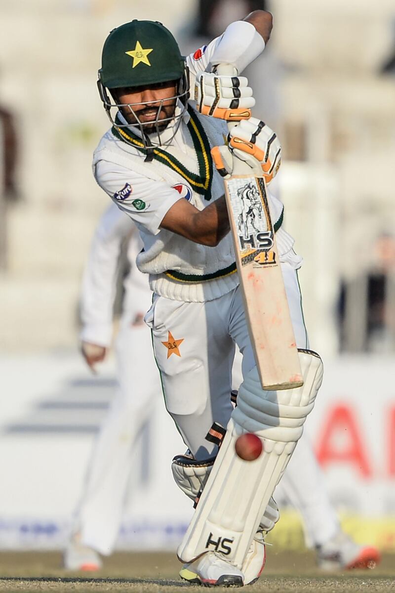Pakistan's Babar Azam plays a shot during the second day of the first cricket Test match between Pakistan and Bangladesh at the Rawalpindi Cricket Stadium in Rawalpindi on February 8, 2020. / AFP / AAMIR QURESHI
