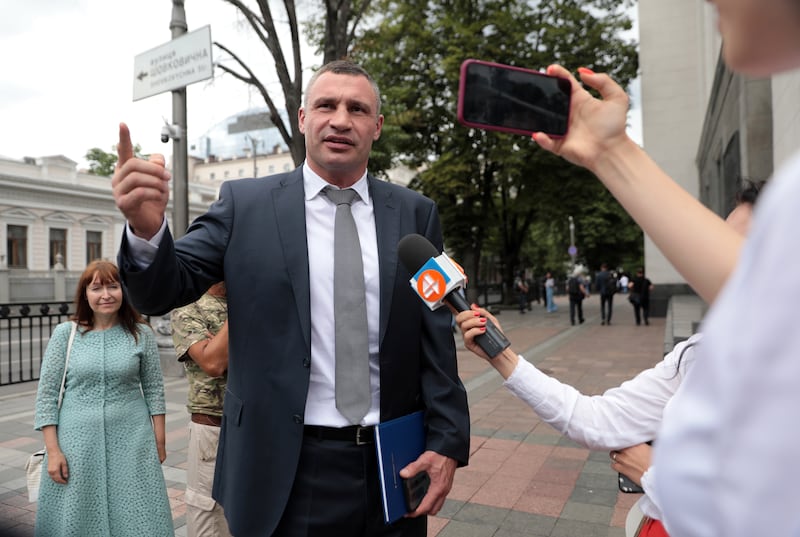 Former boxing world champion and mayor of Ukraine's capital, Vitali Klitschko, speaks outside the parliament building in Kiev last year. Getty images