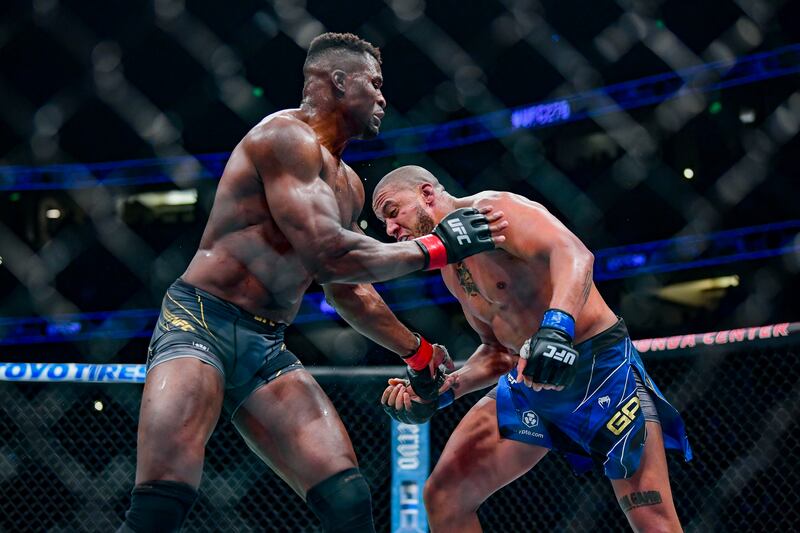 Francis Ngannou and Ciryl Gane trade blows during their heavyweight title bout at UFC 270. USA TODAY Sports