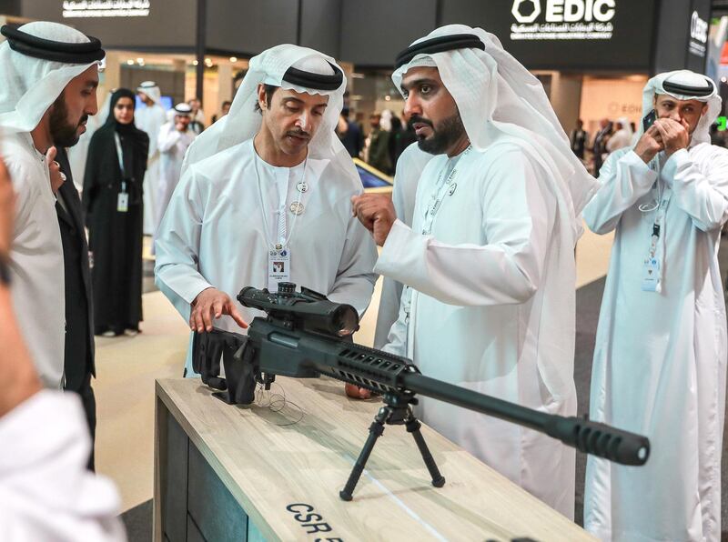 Abu Dhabi, U.A.E., February 17, 2019. INTERNATIONAL DEFENCE EXHIBITION AND CONFERENCE  2019 (IDEX) Day 1--  (Left)Sheikh Hazza bin Zayed Al Nahyan Head of State for National Security, UAE, visits the Caracal Firearms stand and looks at the  CSR 50 sniper rifle with Caracal CEO, Hamd Al Ameri.
Victor Besa/The National
Section:  NA
Reporter:  Dania Saadi