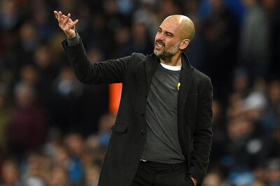 Manchester City's Spanish manager Pep Guardiola gestures on the touchline during the UEFA Champions League round of sixteen second leg football match between Manchester City and Basel at the Etihad Stadium in Manchester, north west England, on March 7, 2018. / AFP PHOTO / Oli SCARFF