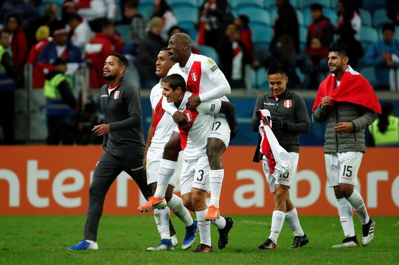 Peru's players celebrate their victory during the Copa America 2019 semi-finals soccer match between Chile and Peru at Arena do Gremio Stadium in Porto Alegre, Brazil.  EPA