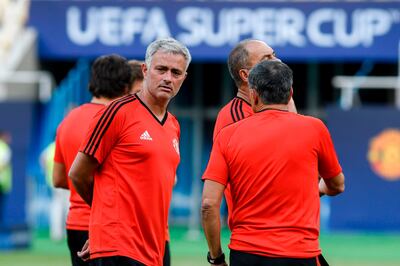 Manchester United's Portuguese manager Jose Mourinho (L) looks on during training session ahead of the UEFA Super Cup 2017 football match between Real Madrid and Manchester United at The National Arena Filip II in Skopje on August 7, 2017.
Cristiano Ronaldo could feature against his former club Manchester United in Tuesday's UEFA Super Cup after being included in Real Madrid boss Zinedine Zidane's squad for the trip to Skopje, Macedonia. / AFP PHOTO / NIKOLAY DOYCHINOV