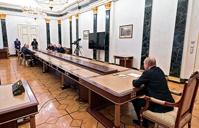 Russian President Vladimir Putin, right, leads a meeting on economic issues in Moscow. AP
