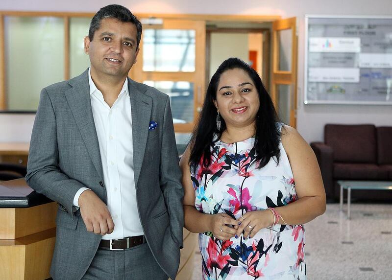 Arshi Kaura, right, the managing partner of Legends Accounting Services, was joined by her husband, Vikas Takhtani, once her business became successful enough. Satish Kumar / The National