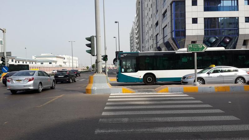 The picture, taken by a reader, shows how drivers in Abu Dhabi continue to stop their vehicles in the middle of pedestrian crossings despite warnings that doing so could result in a fine of Dh500. Courtesy Iftekhar Ahmed

