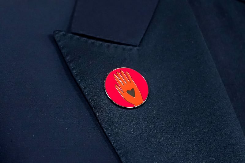 Several celebrities donned the red Artists4Ceasefire pin during the 96th annual Academy Awards ceremony. EPA 