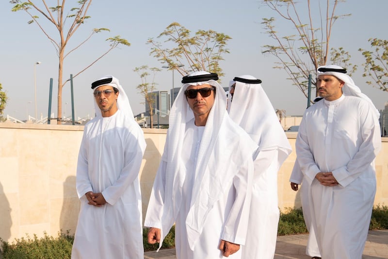 MAHWI, ABU DHABI, UNITED ARAB EMIRATES - September 04, 2019: (L-R) HH Sheikh Mansour bin Zayed Al Nahyan, UAE Deputy Prime Minister and Minister of Presidential Affairs, HH Sheikh Hazza bin Zayed Al Nahyan, Vice Chairman of the Abu Dhabi Executive Council and HE Khaldoon Khalifa Al Mubarak, CEO and Managing Director Mubadala, Chairman of the Abu Dhabi Executive Affairs Authority and Abu Dhabi Executive Council Member, attend the inauguration of the Presidential Guard Martyrs Park, at Mahwi Military Camp.

( Mohamed Al Hammadi / Ministry of Presidential Affairs )
---