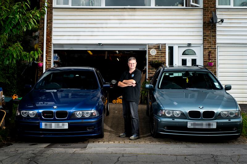 Paul Robins, 60, a part-time plumber in Biggin Hill, Kent, with his Mid-2000 B10 3.3 litre, left, and Mid-2000 BMW 530i Touring. "If TfL [Transport for London] don't respond back before August 29 and deem the car Ulez-compliant, I'll have to consider signing on for unemployment benefits and give up the work I do'
