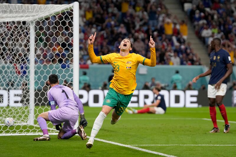 Australia's Craig Goodwin celebrates after scoring the opening goal. AP 