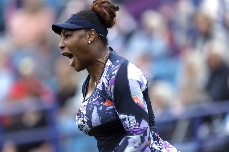 Serena Williams celebrates winning a point in her round of 16 doubles match with Ons Jabeur. PA