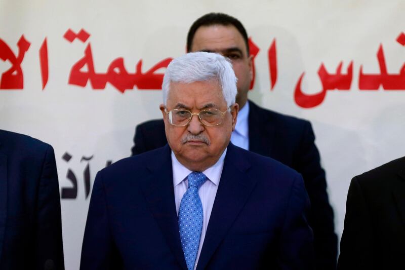 (FILES) In this file photo taken on March 01, 2018 President Mahmud Abbas (C) attends a meeting with the Revolutionary Council of the ruling Fatah party in the West Bank city of Ramallah. 
Palestinian president Mahmud Abbas directly accused Hamas on March 19, 2018 of carrying out a bomb attack against prime minister Rami Hamdallah in Gaza last week, threatening fresh sanctions against them. / AFP PHOTO / ABBAS MOMANI