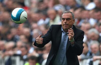 NEWCASTLE, UNITED KINGDOM - MAY 05: Chelsea Manager Avram Grant tosses the ball back in to play during the Barclays Premier League match between Newcastle United and Chelsea at St James' Park on May 5, 2008 in Newcastle, England.  (Photo by Clive Rose/Getty Images)