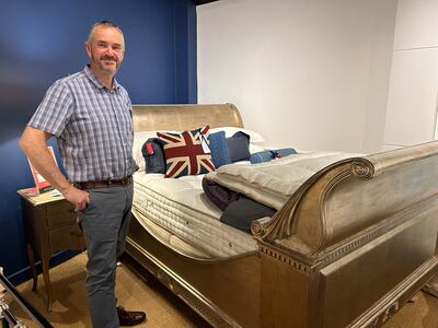 Patrick Clacy owns And So to Bed, a bed specialist shop in Oxford. He will not take on new staff, nor replace his business's delivery van next year. Matthew Davies/The National