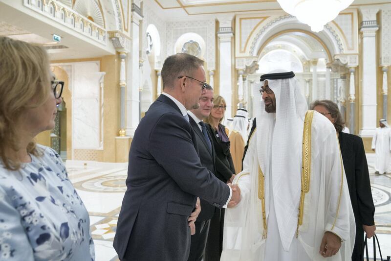 ABU DHABI, UNITED ARAB EMIRATES - October 21, 2018: HH Sheikh Mohamed bin Zayed Al Nahyan, Crown Prince of Abu Dhabi and Deputy Supreme Commander of the UAE Armed Forces (R), greets members of delegation accompanying HE Boyko Borisov, Prime Minister of Bulgaria (not shown), during a reception held at the Presidential Palace.

( Mohamed Al Hammadi / Crown Prince Court - Abu Dhabi )
---