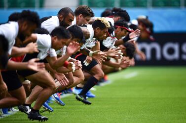 TOPSHOT - Japan's players takes part in a captain's run training session at Shizuoka Stadium Ecopa in Shizuoka on September 27, 2019, on the eve of their Japan 2019 Rugby World Cup Pool A match against Ireland. / AFP / Anne-Christine POUJOULAT