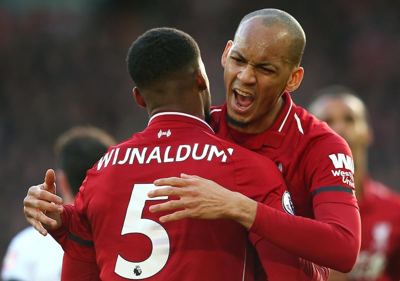 LIVERPOOL, ENGLAND - FEBRUARY 09:  Georginio Wijnaldum of Liverpool celebrates after scoring his team's second goal with teammate Fabinho during the Premier League match between Liverpool FC and AFC Bournemouth at Anfield on February 9, 2019 in Liverpool, United Kingdom.  (Photo by Alex Livesey/Getty Images)