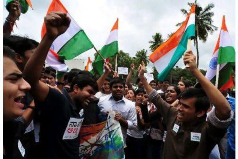 Supporters of Indian activist Anna Hazare at an anti-corupption rally at yesterday in Bangalore.