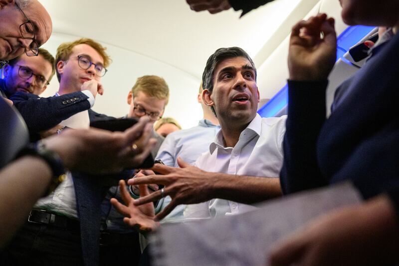 Prime Minister Rishi Sunak holds a Sunday briefing on board a flight to Bali, Indonesia, to attend the G20 summit. PA