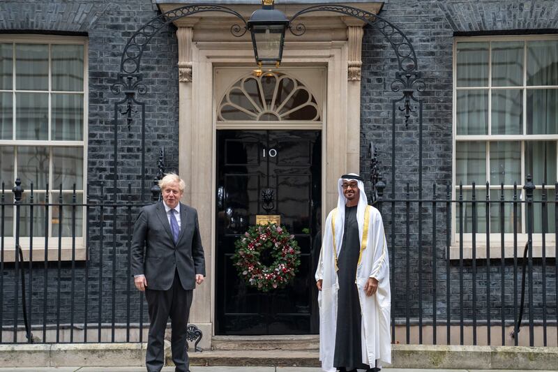 LONDON, UNITED KINGDOM - December 10, 2020: HH Sheikh Mohamed bin Zayed Al Nahyan, Crown Prince of Abu Dhabi and Deputy Supreme Commander of the UAE Armed Forces (R), stands for a photograph with The Rt Hon Boris Johnson, Prime Minister of the United Kingdom (L), prior to a meeting at No 10 Downing Street. 

( Hamad Al Kaabi / Ministry of Presidential Affairs )​
---