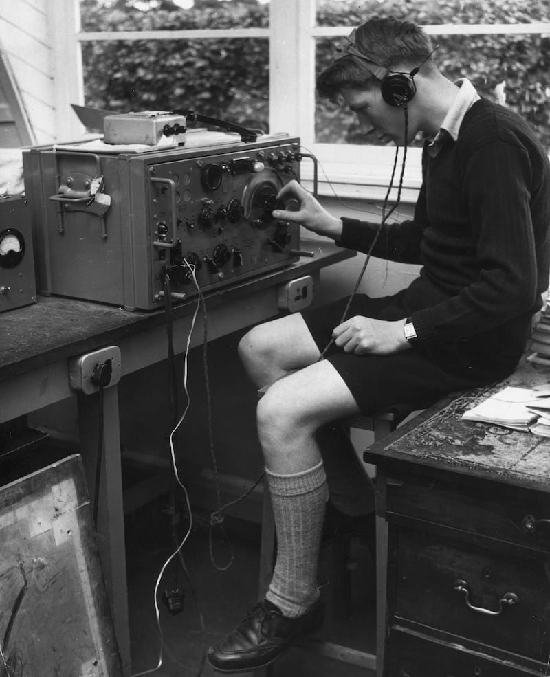 Michael Lucas, a pupil at Gordonstoun, tunes a piece of equipment used for electronics training at the end of term in 1961